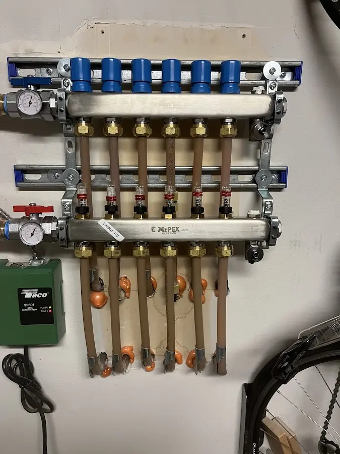 Plumber performing Gas Leak Detection at a residential property in East Rockaway